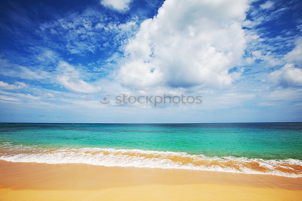 Similar – beach of sand with sun hat