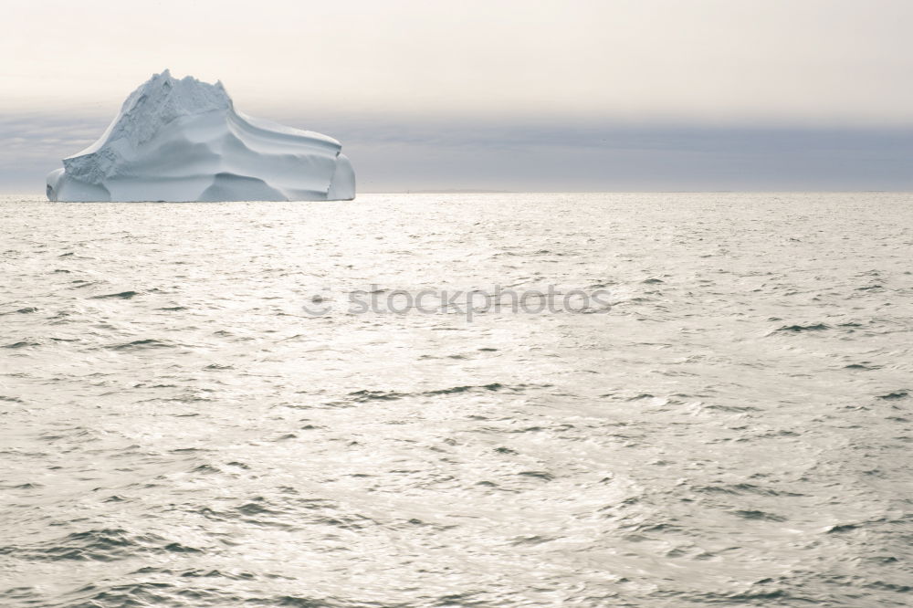 Similar – iceberg Ocean Lake Iceberg