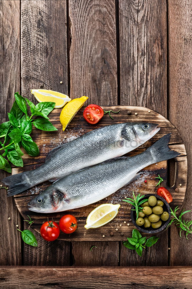 Similar – Image, Stock Photo Preparing whole salmon fish for cooking