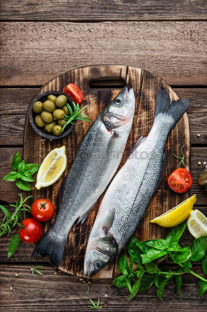 Similar – Image, Stock Photo Preparing whole salmon fish for cooking
