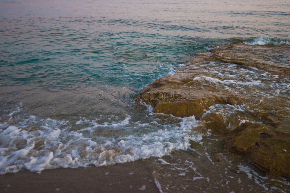 Similar – Stones as breakwaters