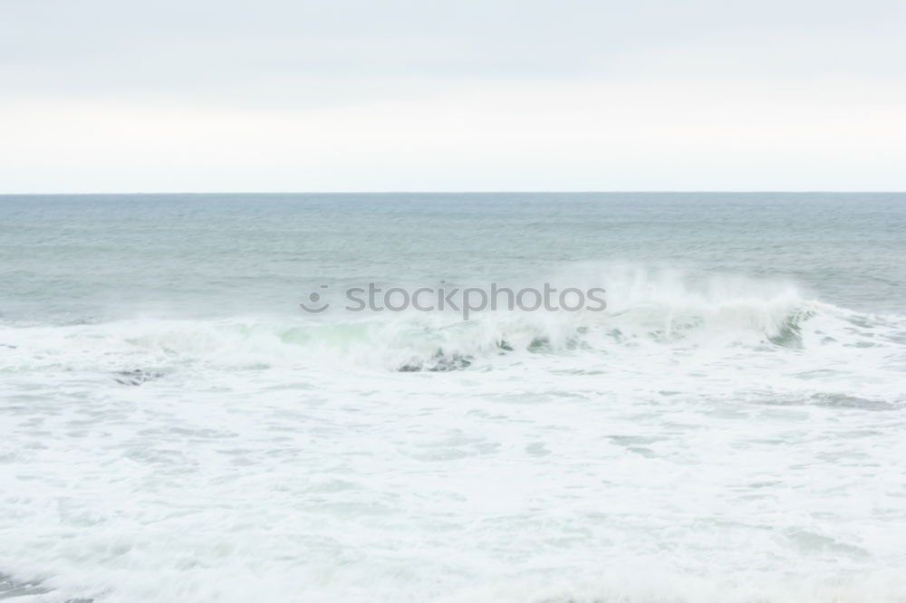 Similar – Surfers in the Atlantic Ocean