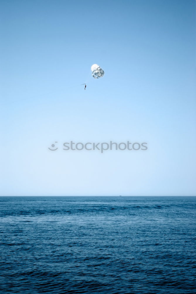 Similar – Image, Stock Photo Lone Woman Paddles on Blue Ocean Surface