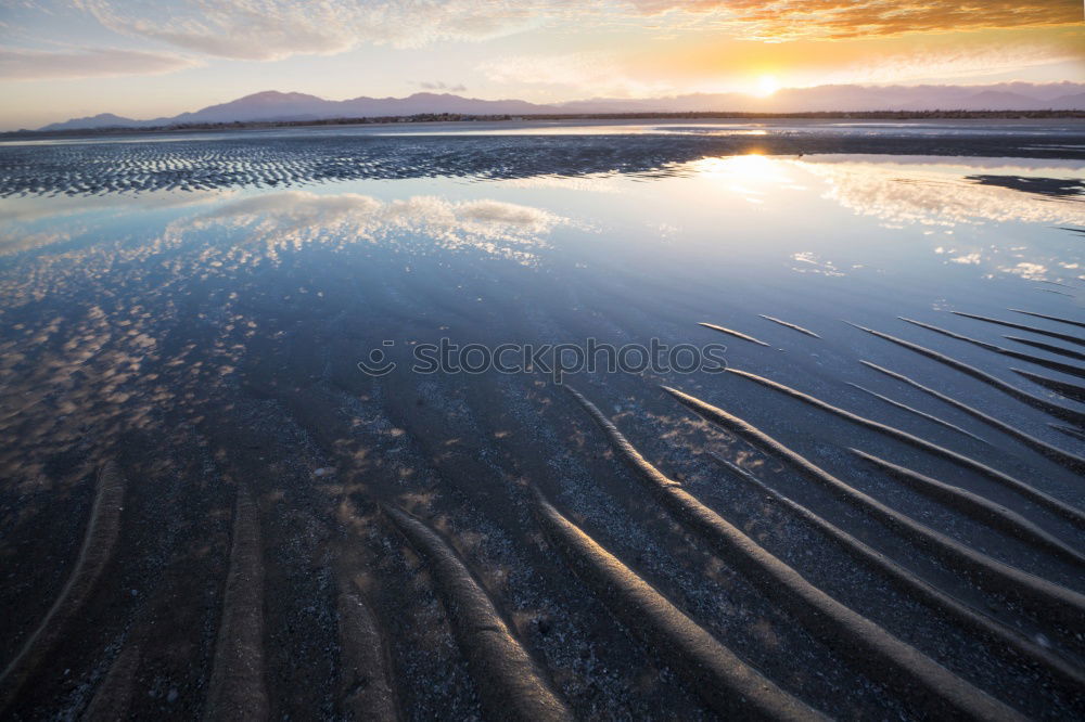 Similar – Warm twilight landscape on a beautifull cloudy sky