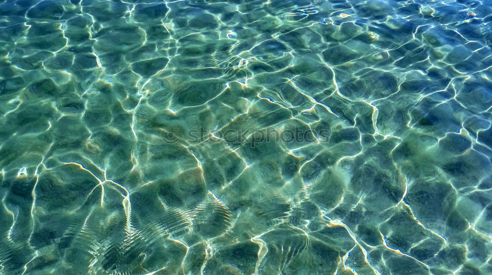 Similar – Foto Bild Lichtreflexionen auf der Wasseroberfläche