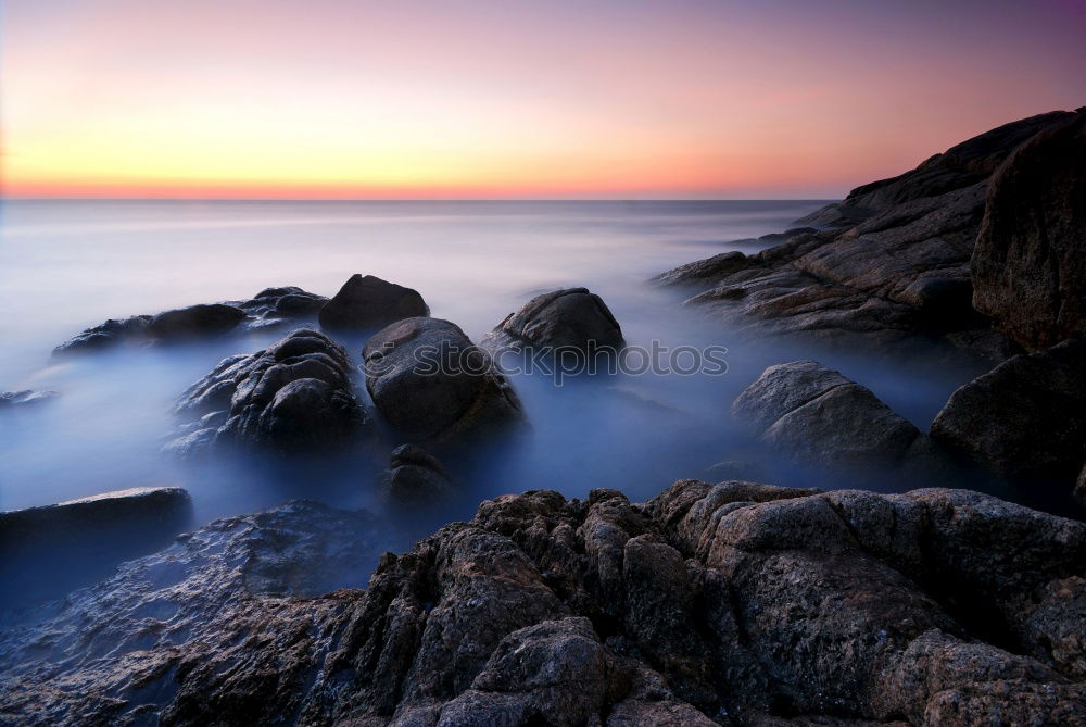 Similar – Image, Stock Photo Liapades Beach, evening atmosphere on a stony beach, waves breaking on a rock behind which the sun is setting