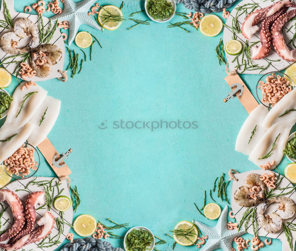 Similar – Image, Stock Photo Various seafood on blue with algae