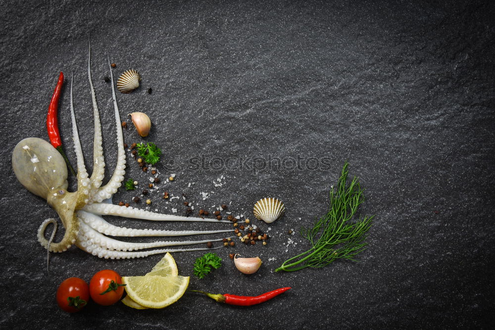 Similar – Image, Stock Photo Mushrooms and parsley on slate table.