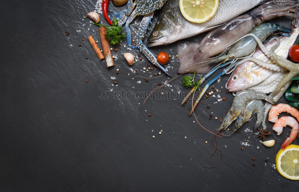 Similar – Image, Stock Photo Raw Sea bream fish on dark