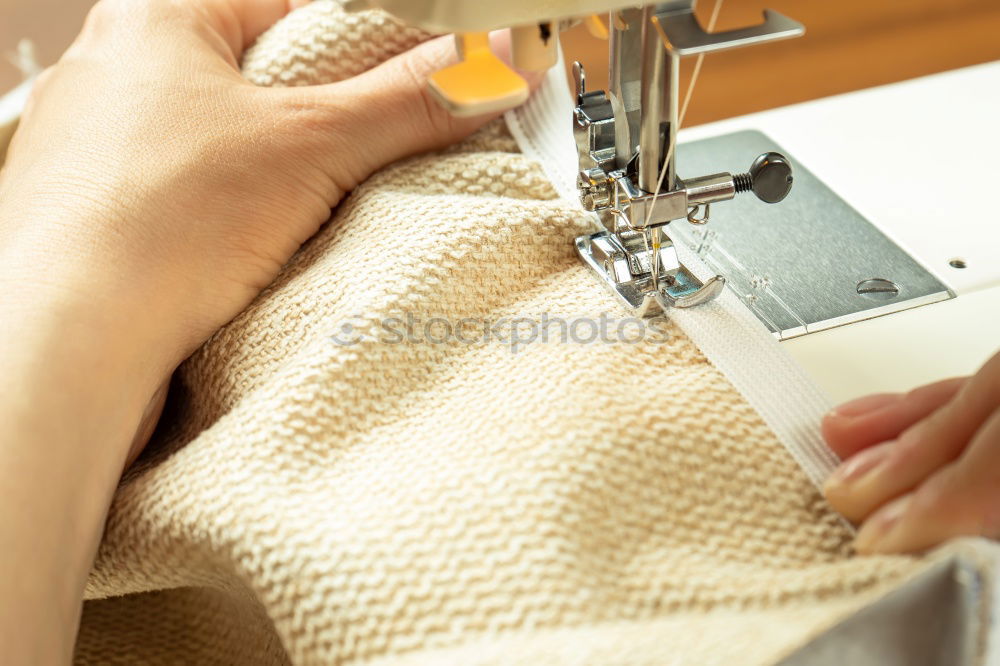 Similar – Image, Stock Photo Woman sewing on a sewing machine