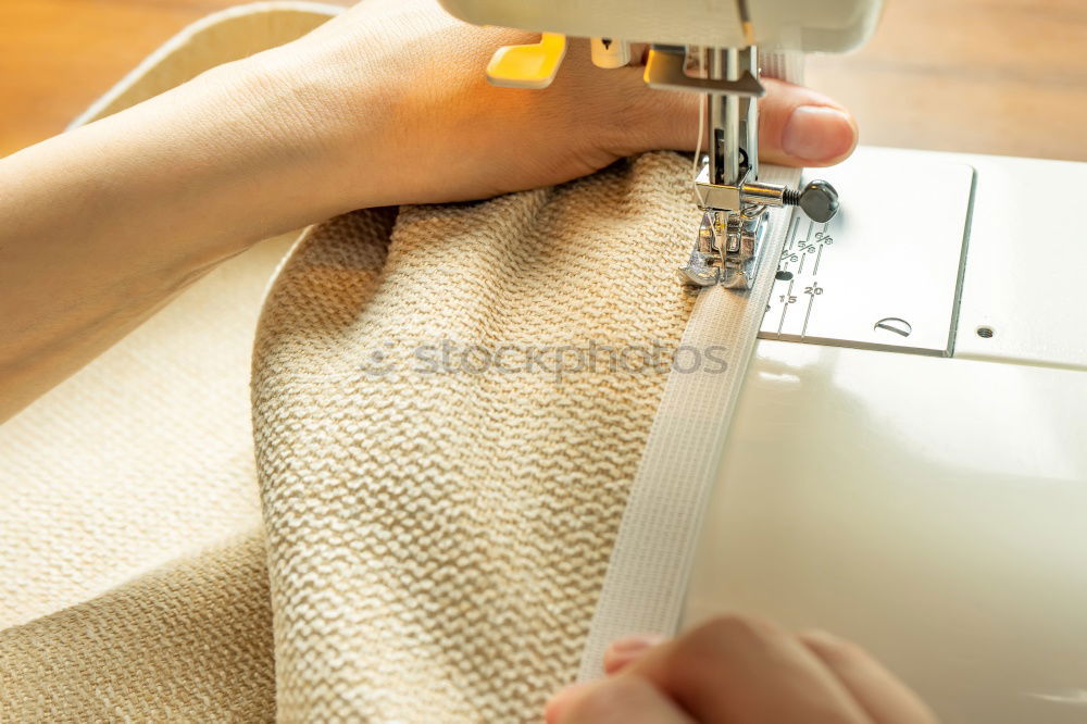 Similar – Image, Stock Photo Woman sewing on a sewing machine