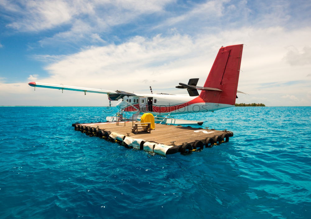 Similar – Image, Stock Photo Hydroplane parked at the pier in maldives