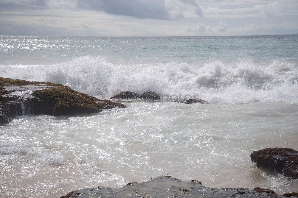 Similar – Image, Stock Photo Stones in the surf Tourism