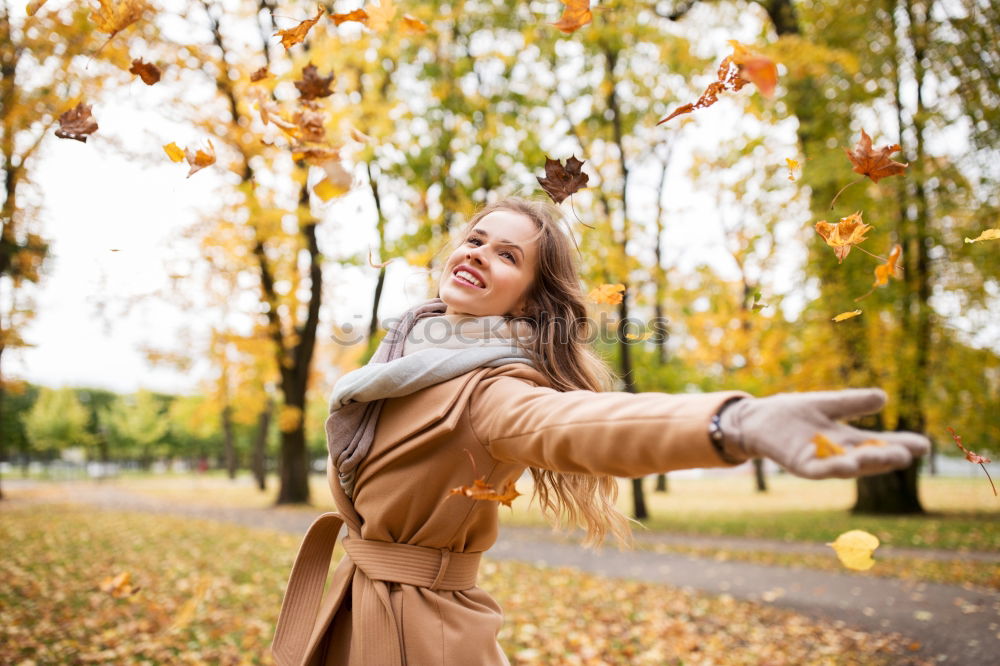 Similar – Image, Stock Photo Portrait of a Young woman using her mobile phone.