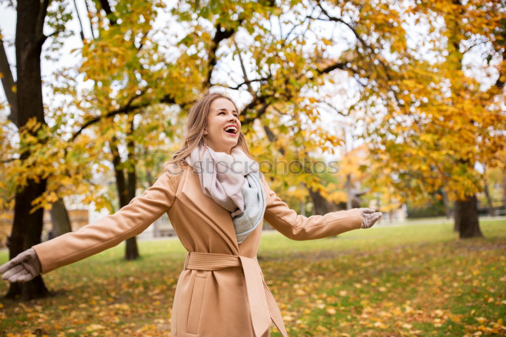 Similar – Young woman with moving hair wearing casual clothes