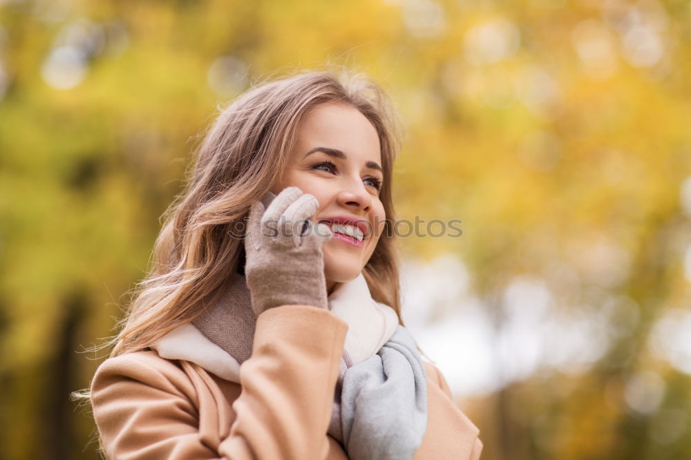 Similar – Image, Stock Photo Portrait of a Young woman using her mobile phone.