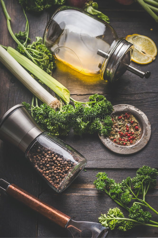 Spices and oil near knife