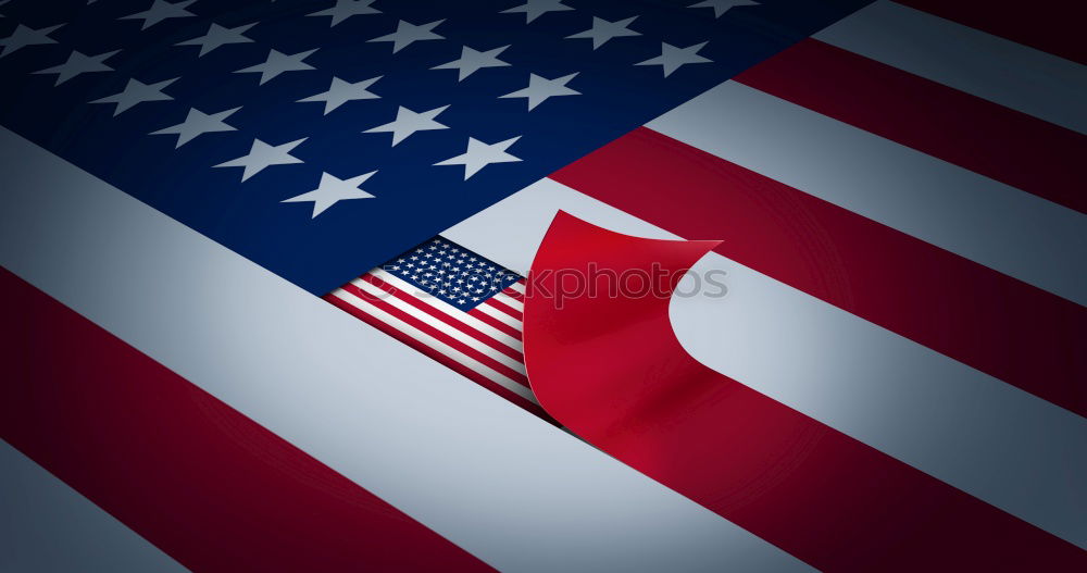 Similar – Man holds American flag in hand