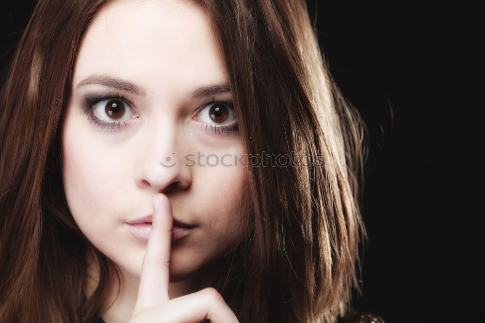 Similar – Elegant young woman doing silent gesture