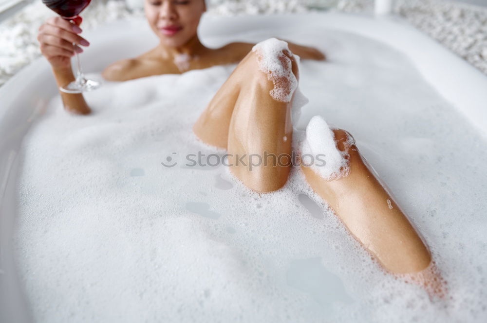 Similar – Woman lying in tub doing hydrotherapy treatment