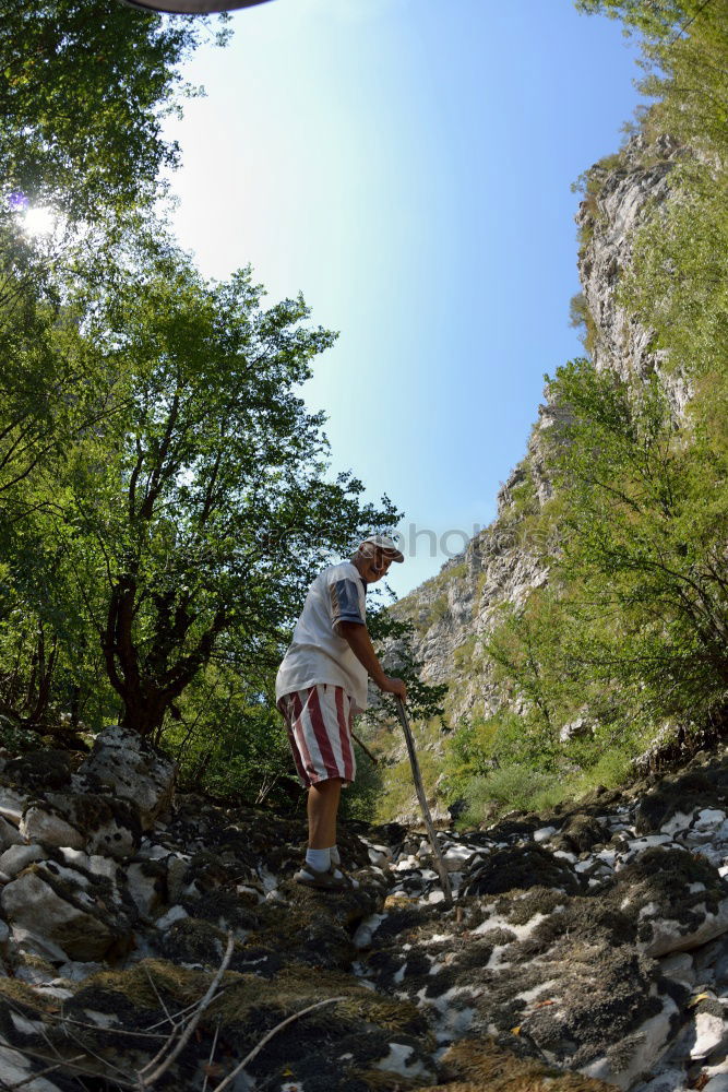 Similar – Image, Stock Photo Woman posing on tropical stream