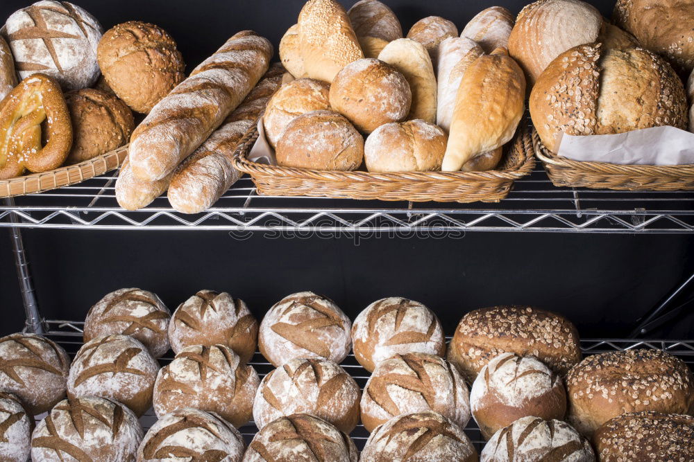 Similar – Many mixed breads and rolls.