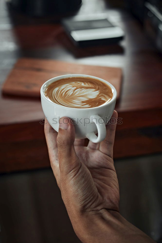 Similar – Image, Stock Photo Barista pouring hot milk prepare latte art on cup of coffee