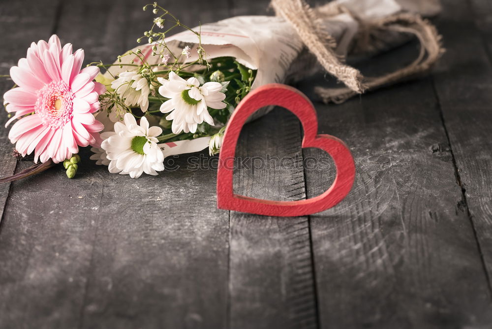 Similar – Image, Stock Photo Blue wooden table with flowers, ribbon and old scissors