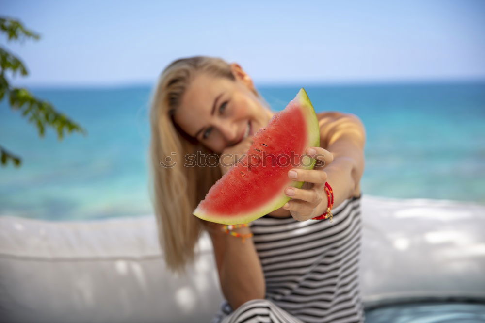 Similar – Image, Stock Photo beautiful young woman holding a piece of watermelon