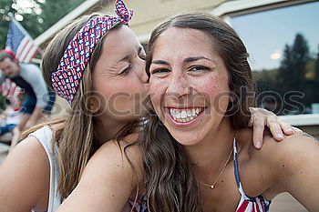 Similar – Teenage girls holding USA flag outdoor