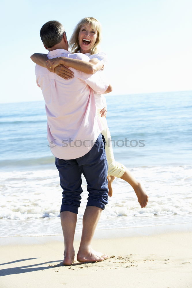 Similar – Image, Stock Photo Mother and son playing on the beach at the day time.