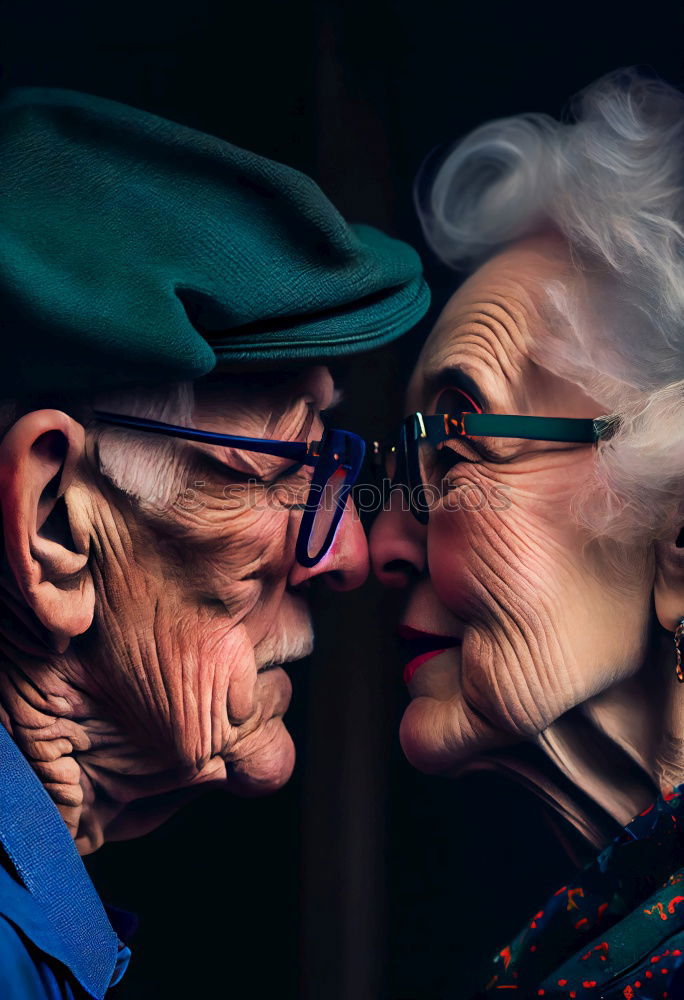 Similar – Smiling senior couple looks lovingly into each other’s eyes