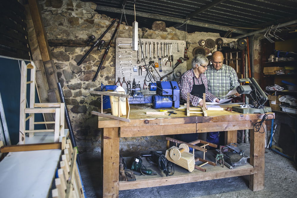Similar – Image, Stock Photo Man doing woodwork in carpentry. Carpentry workshop