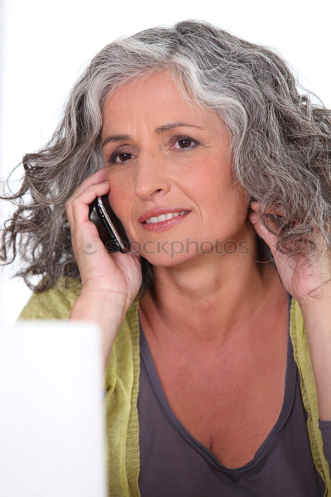 Similar – Image, Stock Photo Elderly woman on the mobile phone at home