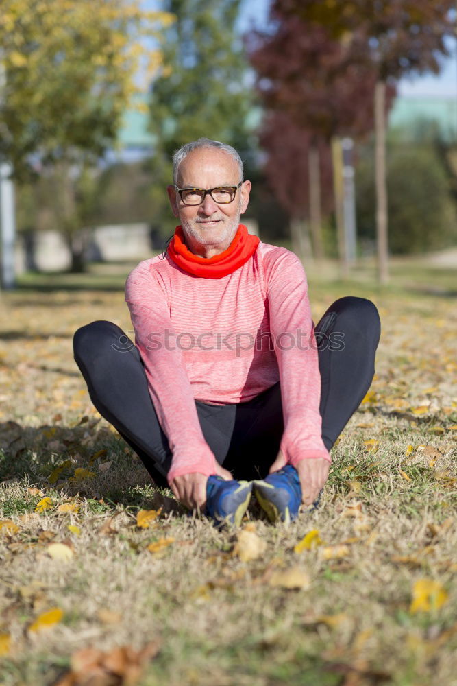 Similar – Senior runner man sitting after jogging in a park