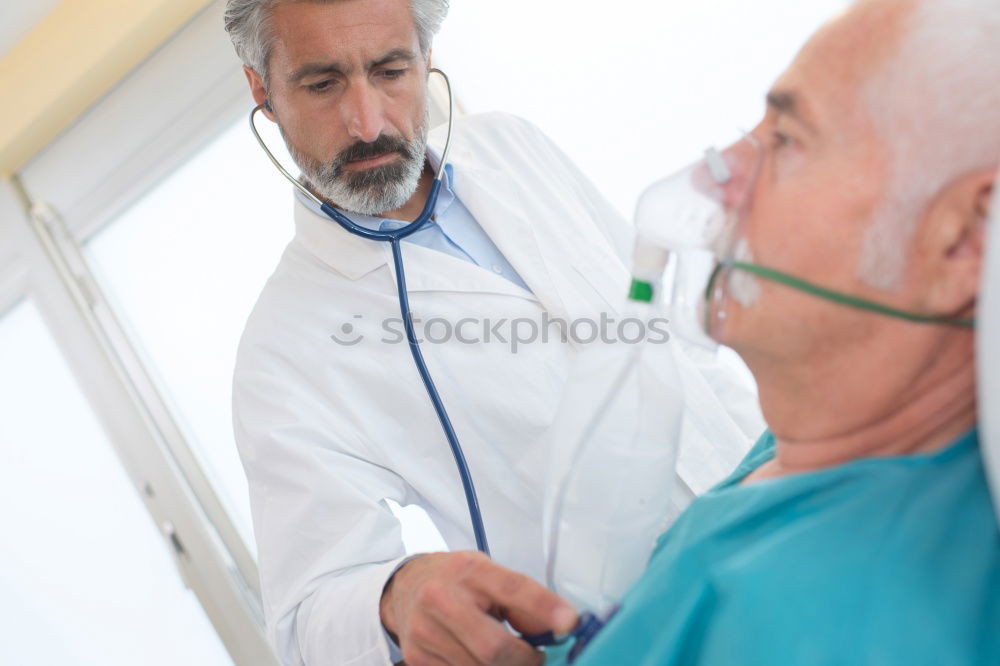 Similar – Doctor holding syringe with vaccine and making injection to senior patient. Covid-19 or coronavirus vaccine