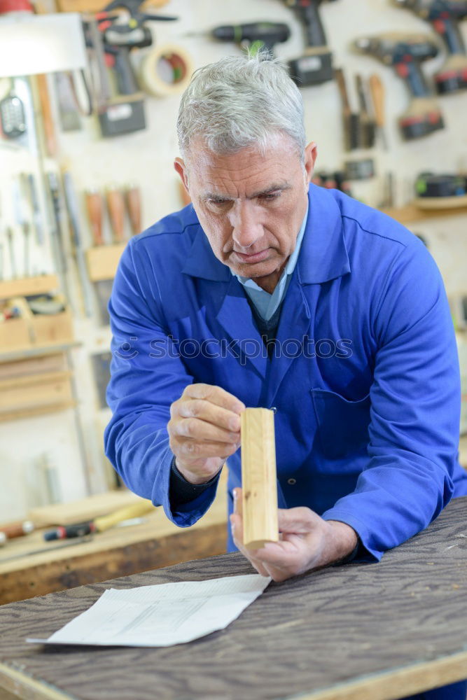 Similar – Professional carpenter at work.