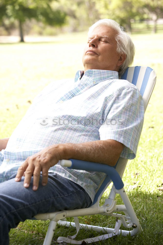 Similar – Handsome man, model of fashion, wearing a sun hat