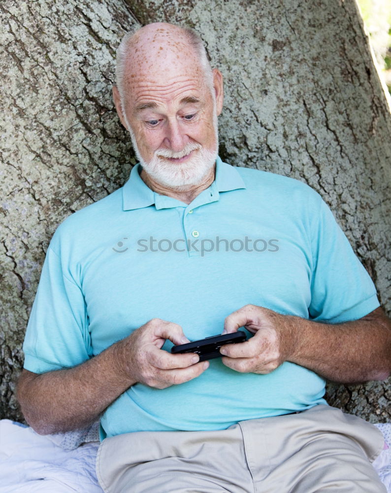 Similar – Image, Stock Photo Senior citizen with smartphone in the woods