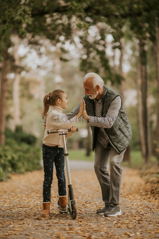 Similar – Portrait of grandfather and grandson embracing