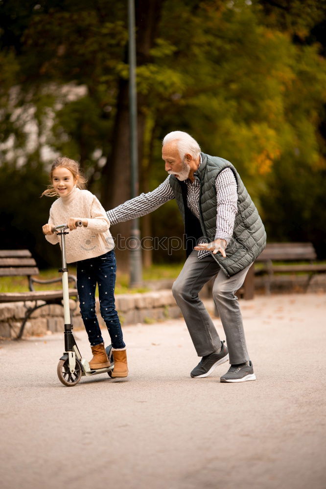 Similar – Image, Stock Photo Grandpa has his grandson on his arm