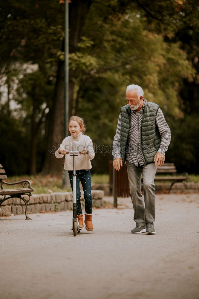 Similar – Image, Stock Photo Grandpa has his grandson on his arm