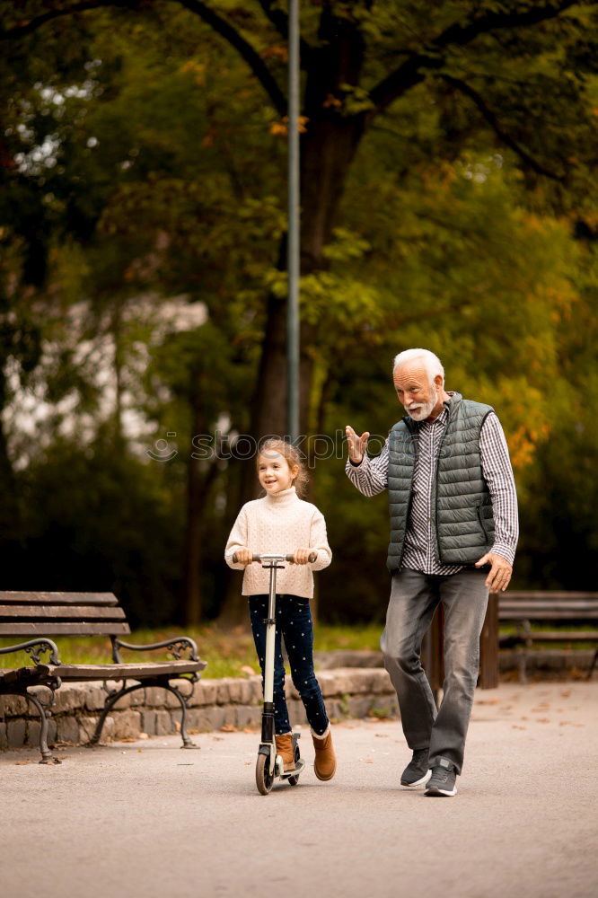 Similar – Image, Stock Photo Grandpa has his grandson on his arm