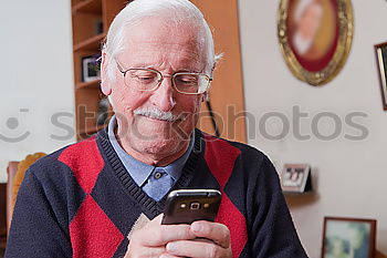 Similar – Image, Stock Photo Senior citizen with smartphone in the woods