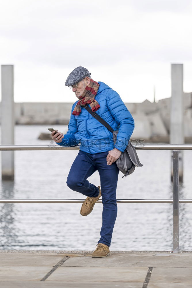 Similar – Image, Stock Photo Portrait senior man walking with his bicycle next to the sea