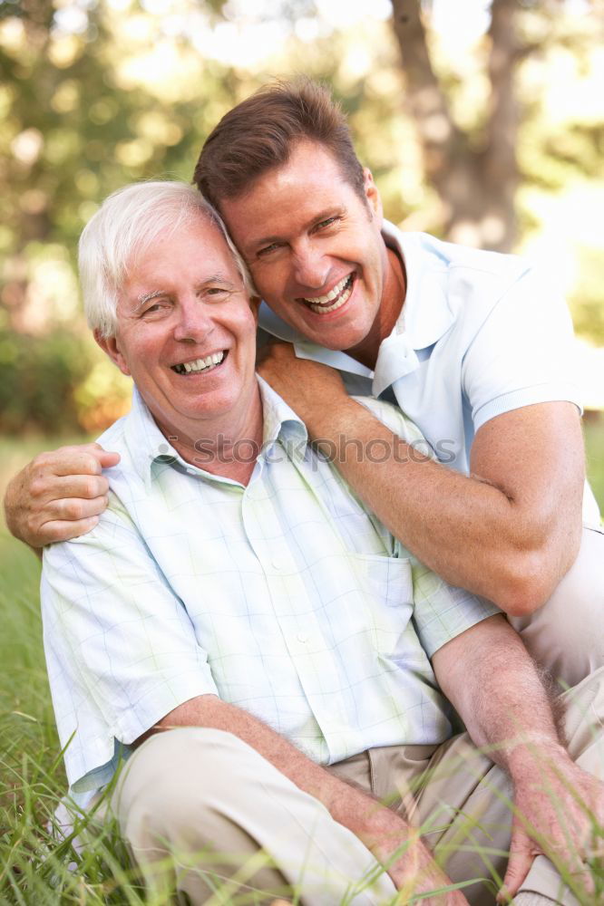 Similar – Portrait of grandfather and grandson embracing