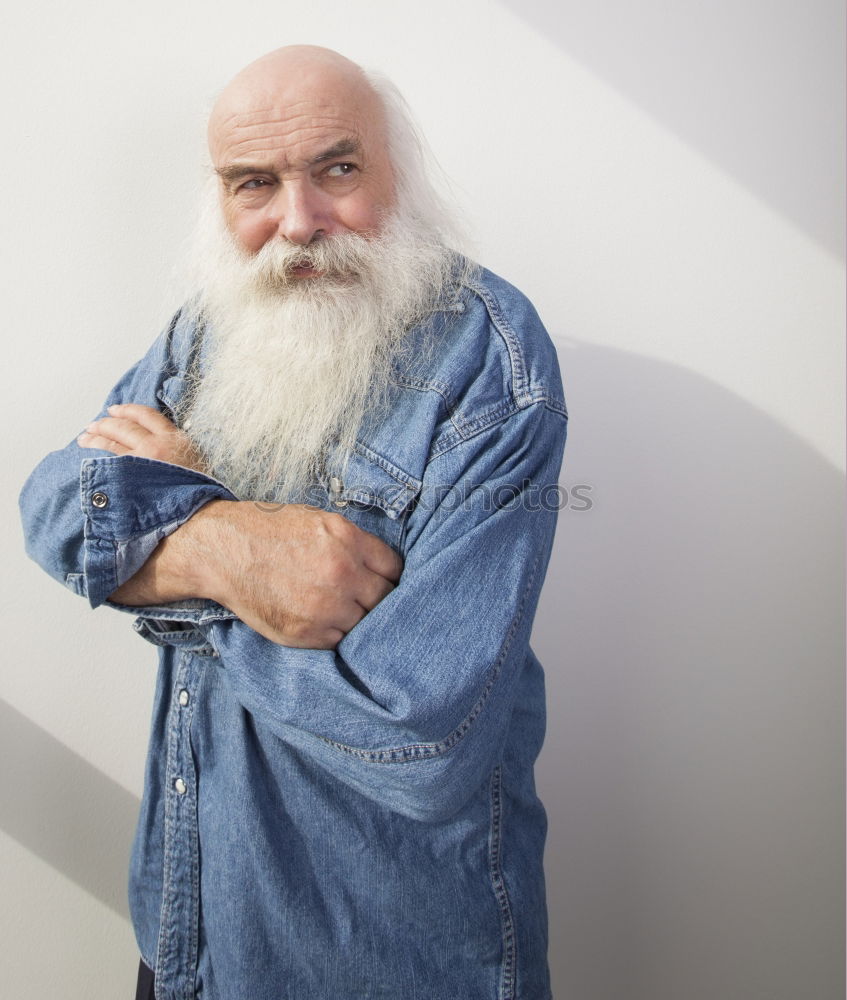 Similar – Image, Stock Photo Cheerful old man with grey hair and long beard looking at camera