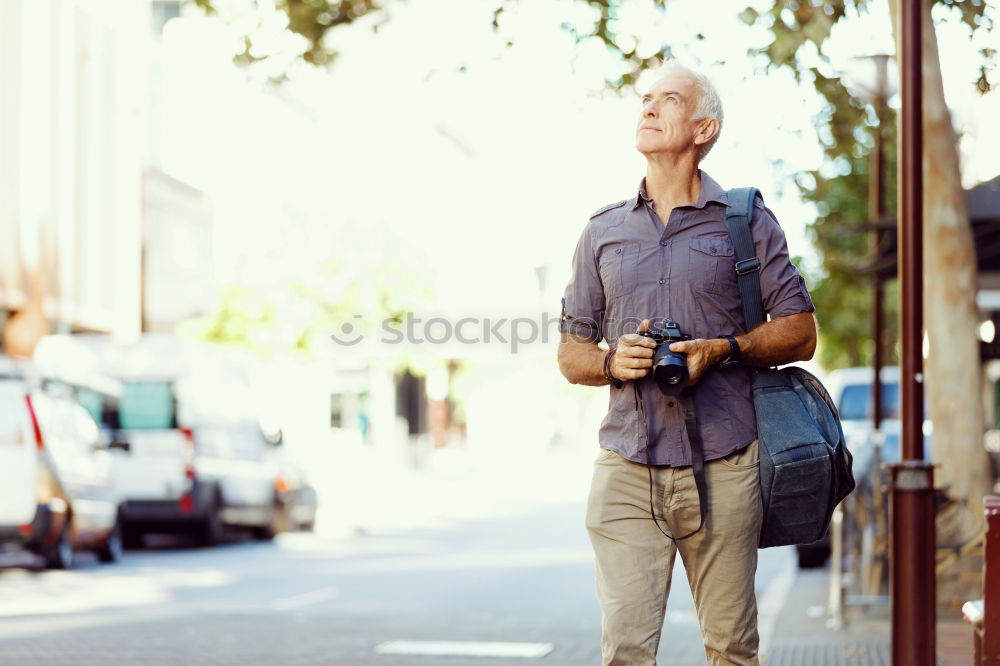 Similar – Image, Stock Photo Young man with mobile phone and fixed gear bicycle.