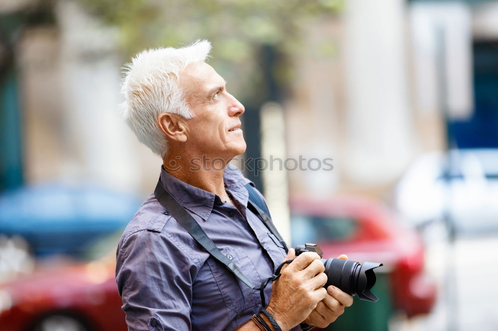 Similar – Senior citizen with smartphone