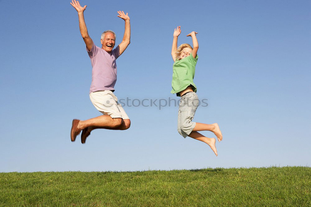 Similar – Image, Stock Photo Father and son walking on the road at the day time. People having fun outdoors. Concept of friendly family.